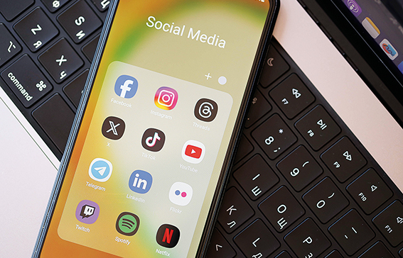 KYIV, UKRAINE - FEBRUARY 28, 2024 Social Media icons group on Galaxy A04s smartphone display